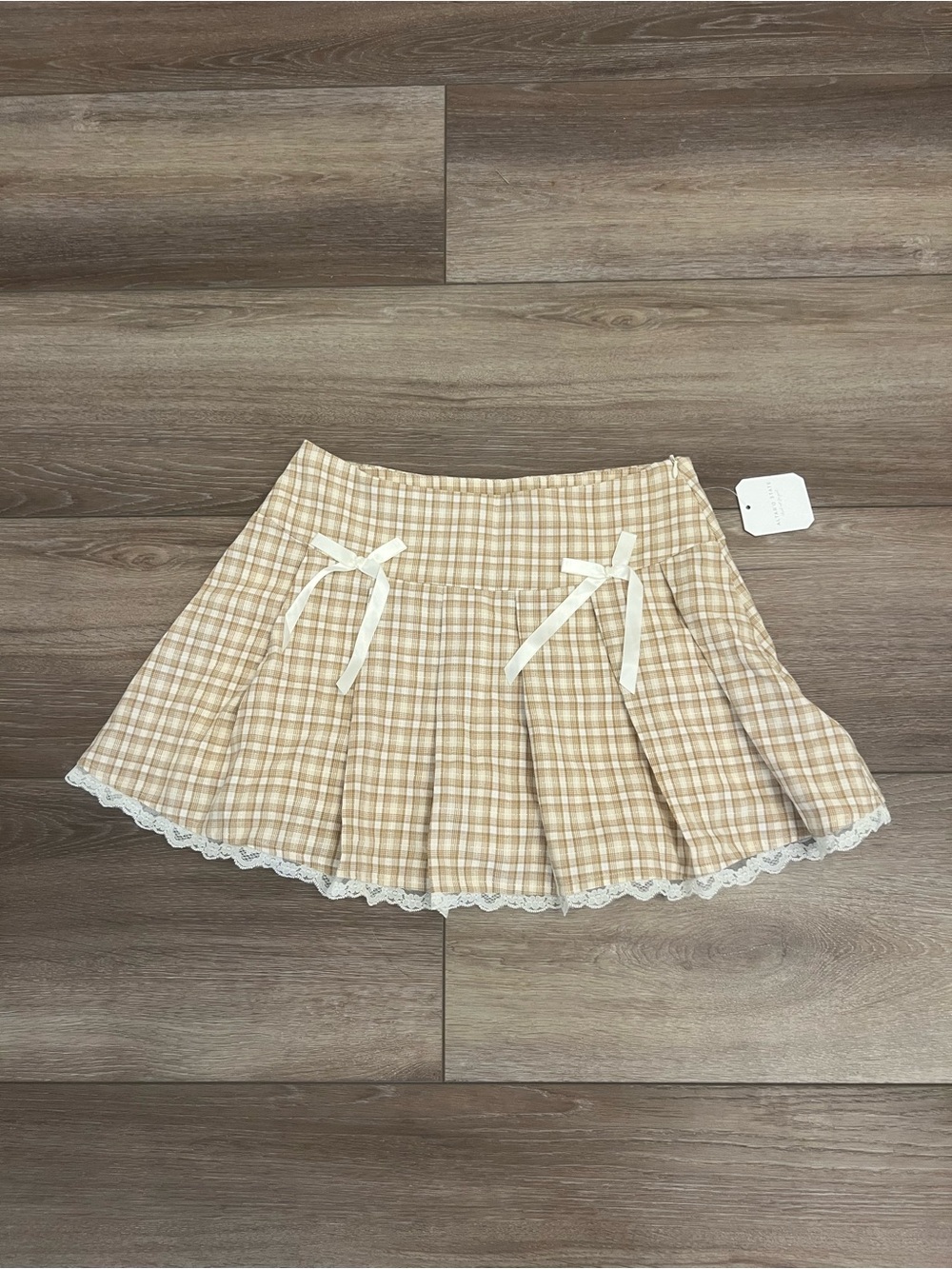 Altar'd State Beige Plaid Pleated Mini Skirt with Lace Trim and Bow Details